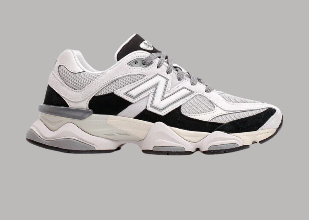 Bróga spóirt unisex New Balance 9060 Dubh Bán