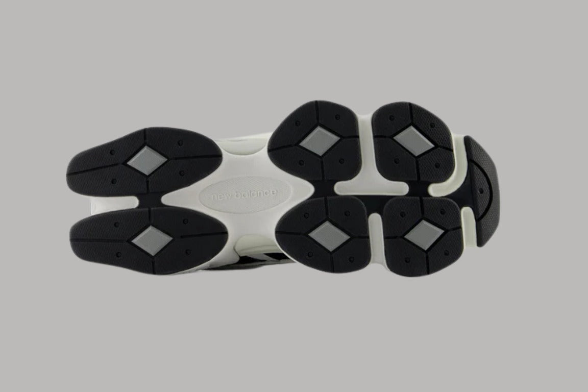 Bróga spóirt unisex New Balance 9060 Dubh Bán