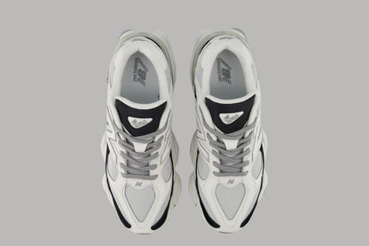 Bróga spóirt unisex New Balance 9060 Dubh Bán