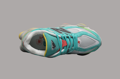 New Balance 9060 Unisex Turnschlappen Cyan Burst