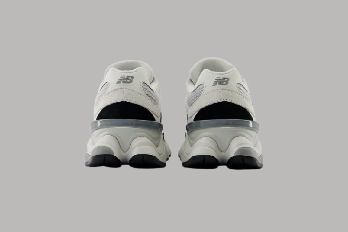Bróga spóirt unisex New Balance 9060 Dubh Bán
