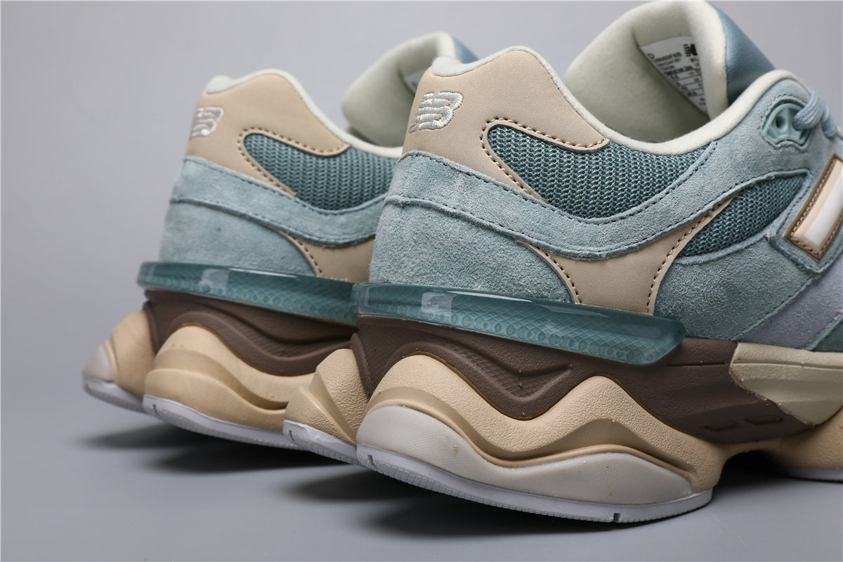 Bróga spóirt unisex New Balance 9060 Gorm