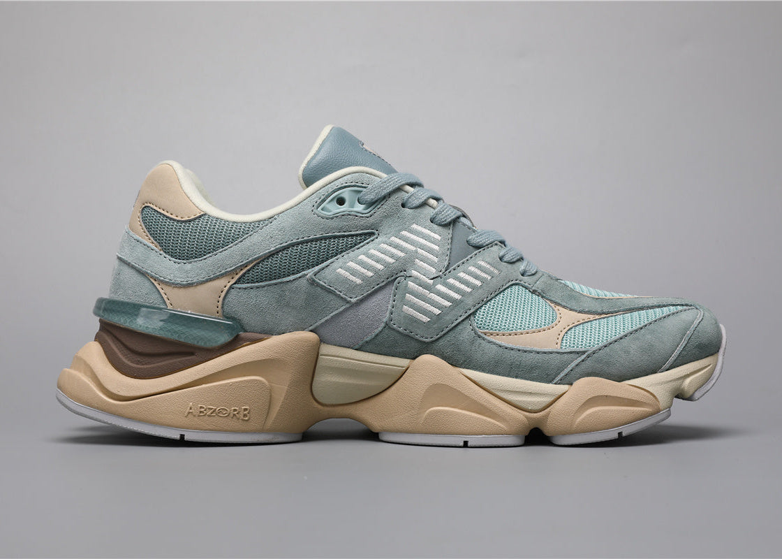 Bróga spóirt unisex New Balance 9060 Gorm