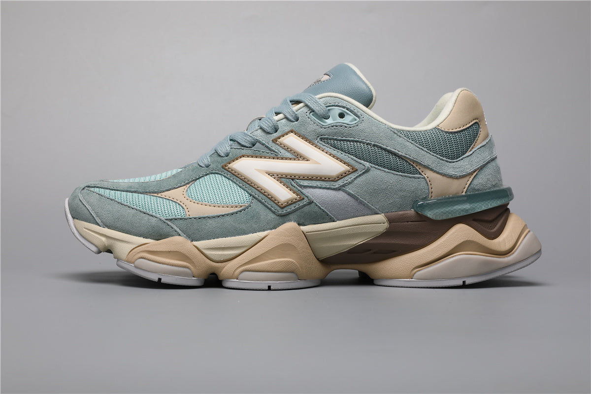 Bróga spóirt unisex New Balance 9060 Gorm