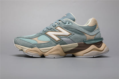 Bróga spóirt unisex New Balance 9060 Gorm