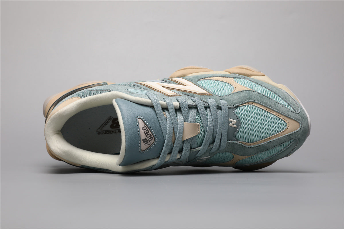 Bróga spóirt unisex New Balance 9060 Gorm